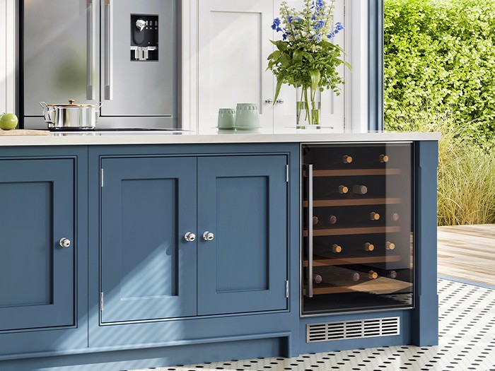 Kitchen island with a wine cooler.